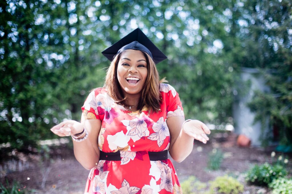 woman wearing academic hat achievement gratitude goals